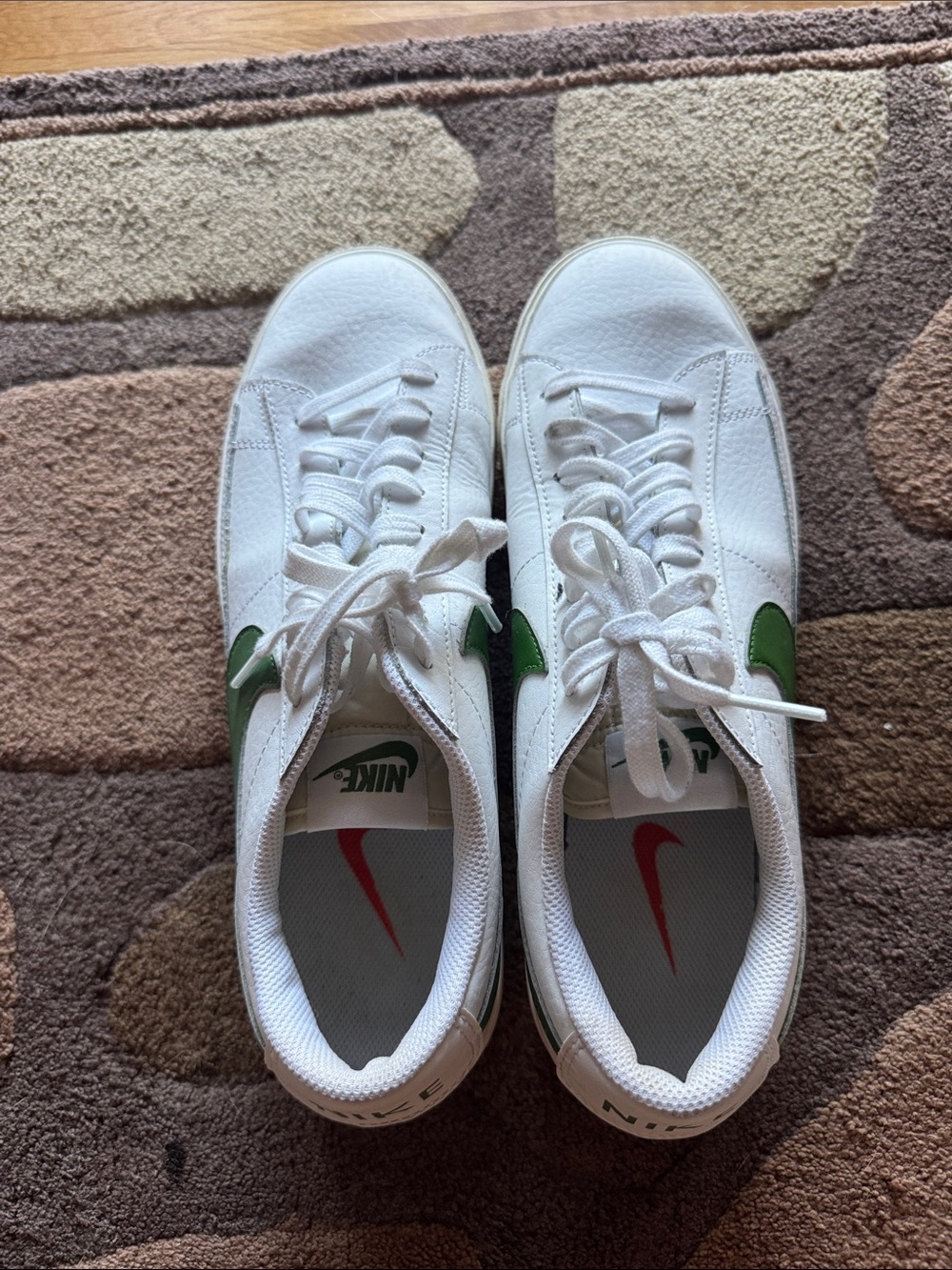 Nike White Low-Top Sneakers with Green Swoosh